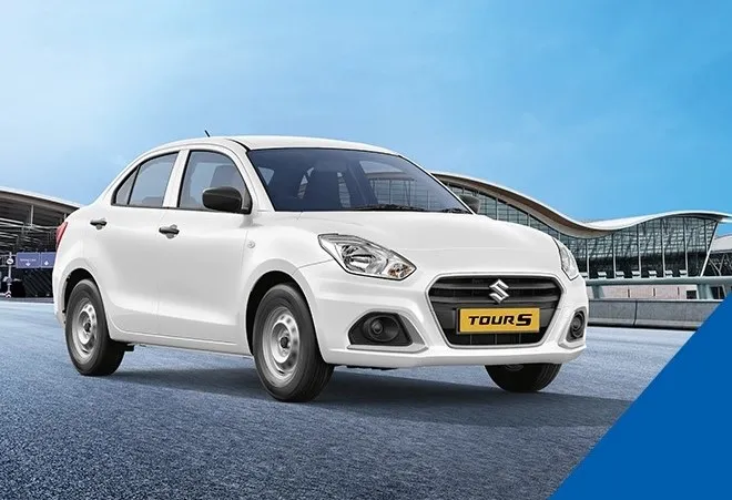 Maruti Suzuki Dzire sedan taxi in white color